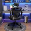 Cadeira gamer ergonômica reclinável preta com apoio de pés e braços ajustáveis