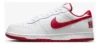 Tênis Nike Big Low Masculino branco com detalhes pretos, visto de perfil.